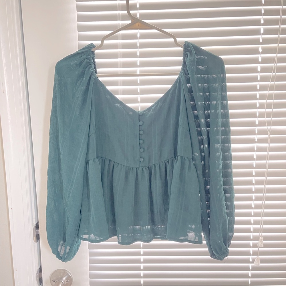 Green Francesca’s fit and flare top